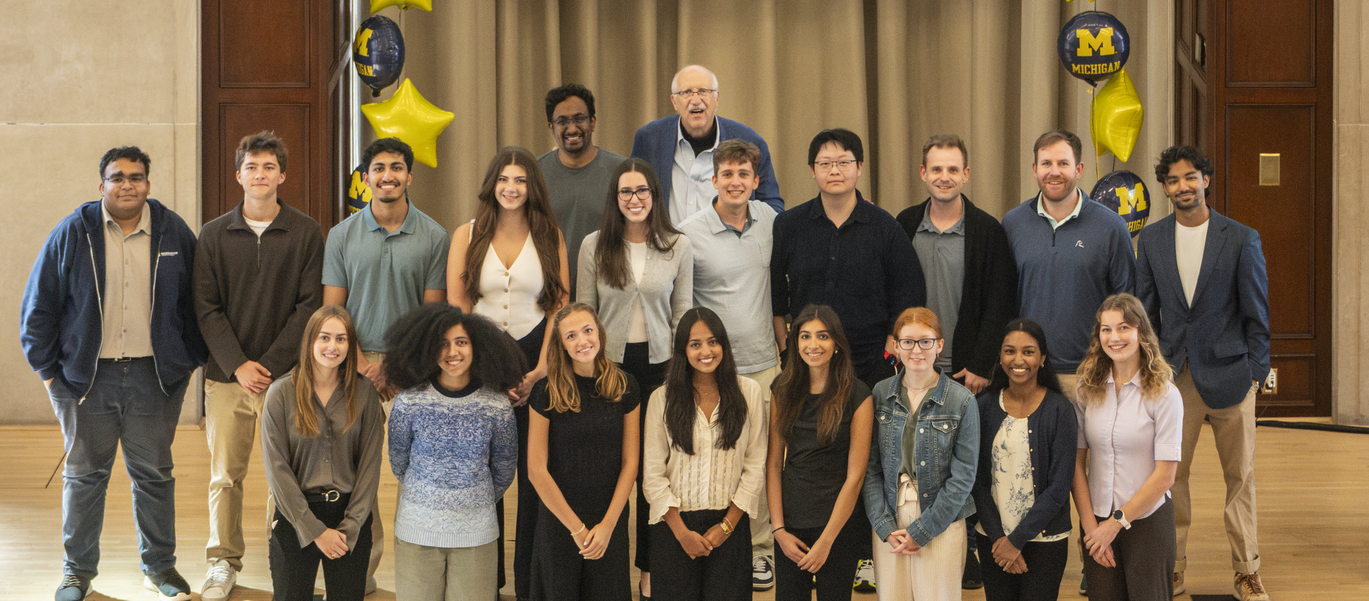 Members of the Athey Lab on stage at the 2026 DCMB, CCMB and Bioinformatics Graduate Program retreat.